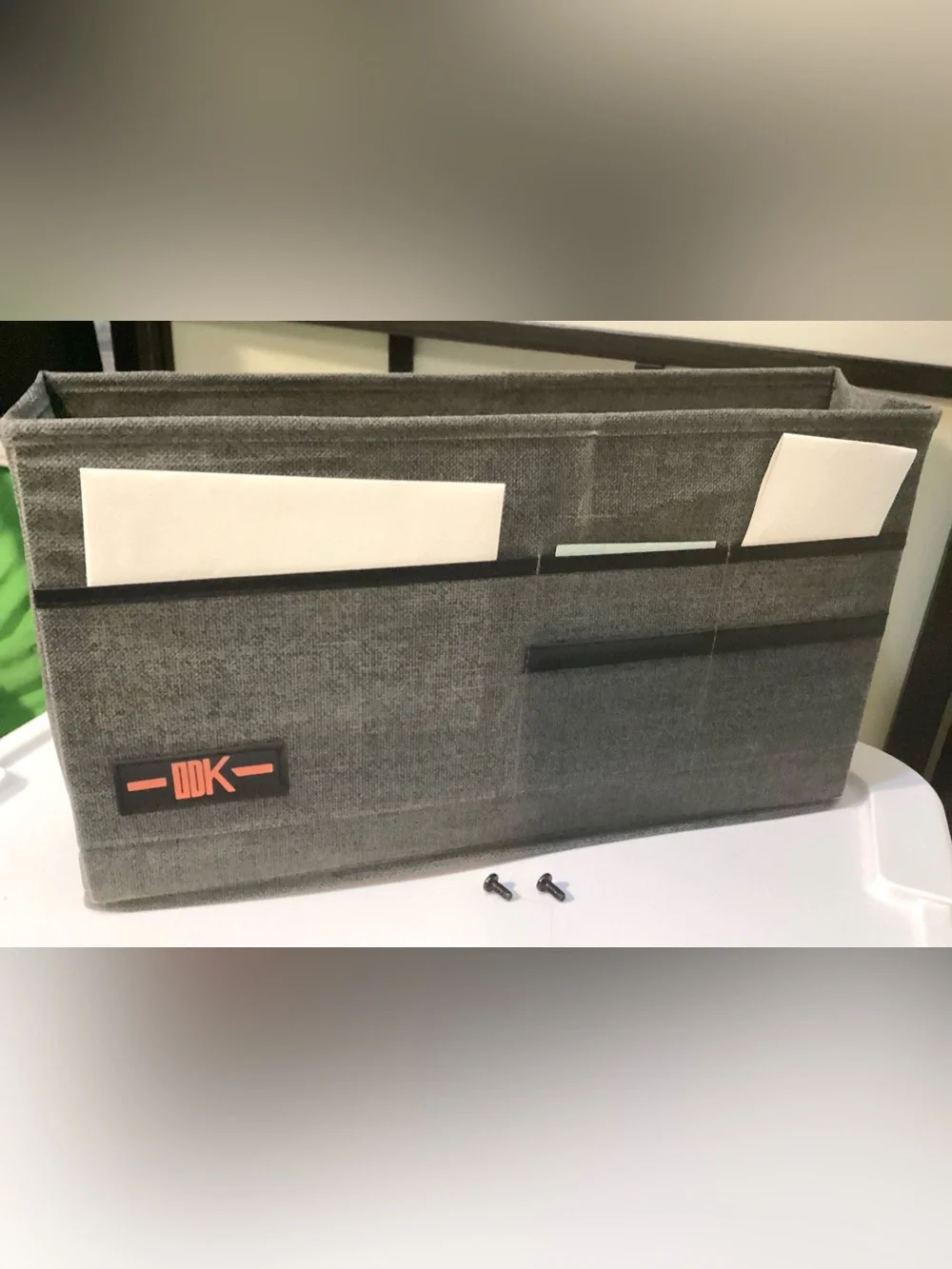 Desk side hanging organizer storage bag with 3 pockets.